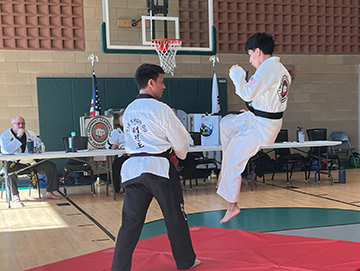 Elgin blk belt boy jump kick