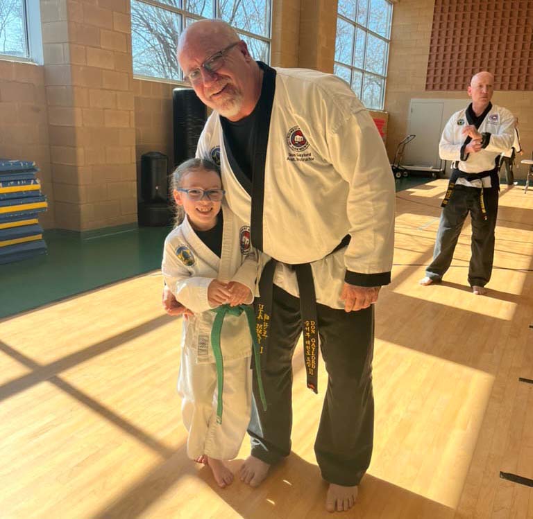 Elgin Don and young student